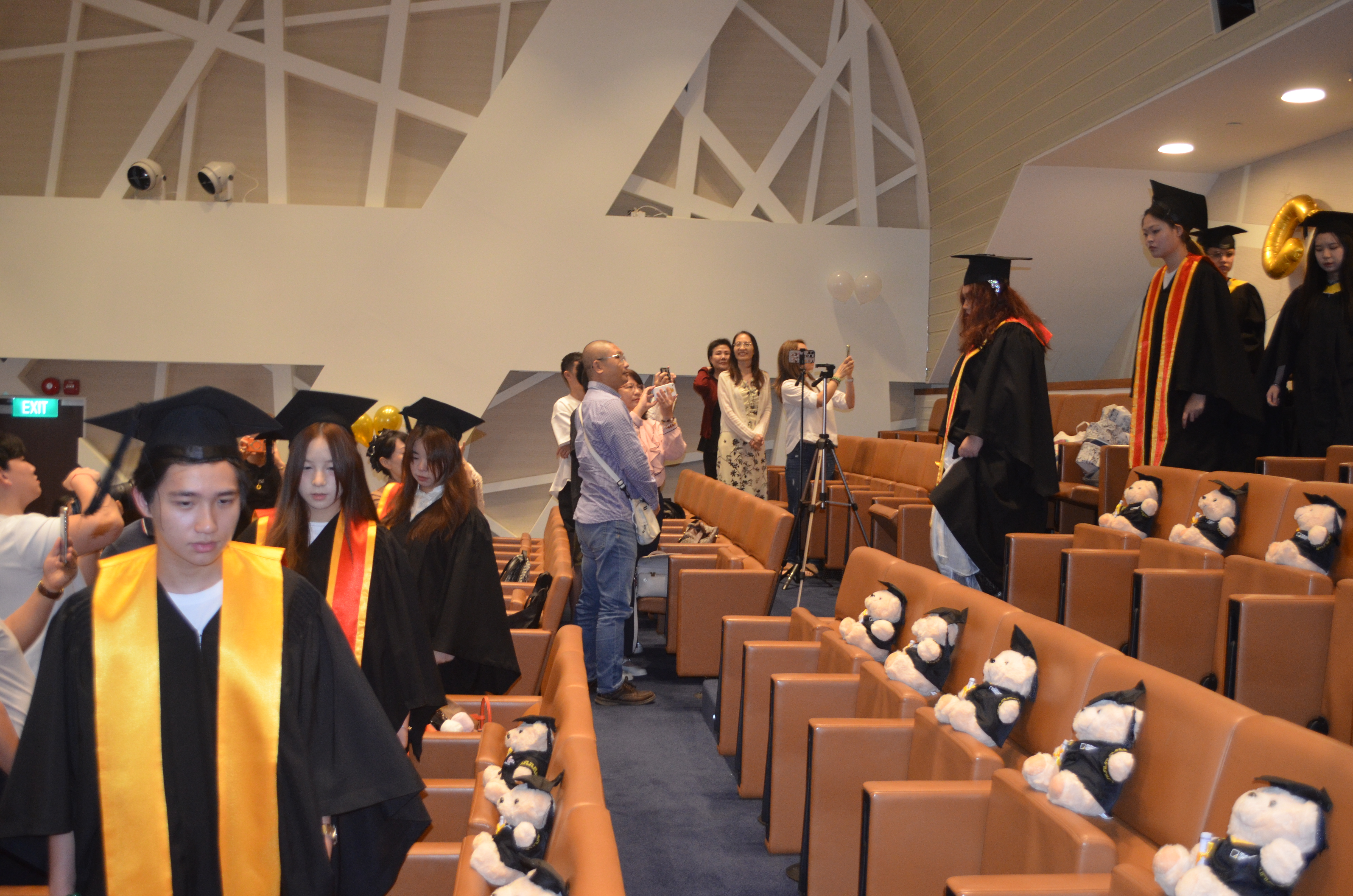 Graduates entering the hall
