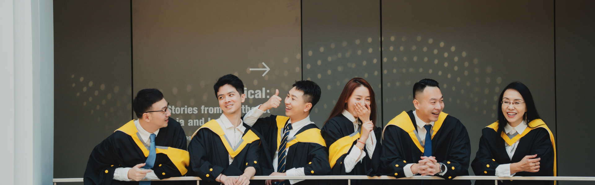 Diverse group of international students graduating from Hanbridge Institute's UK degree programmes in Singapore