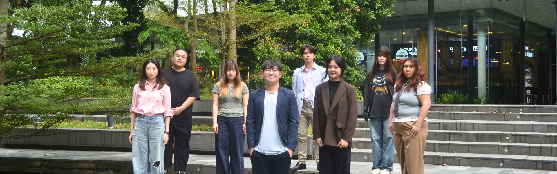 Graduates of the Hanbridge Institute University of Suffolk MBA programme celebrating their one-year degree completion.