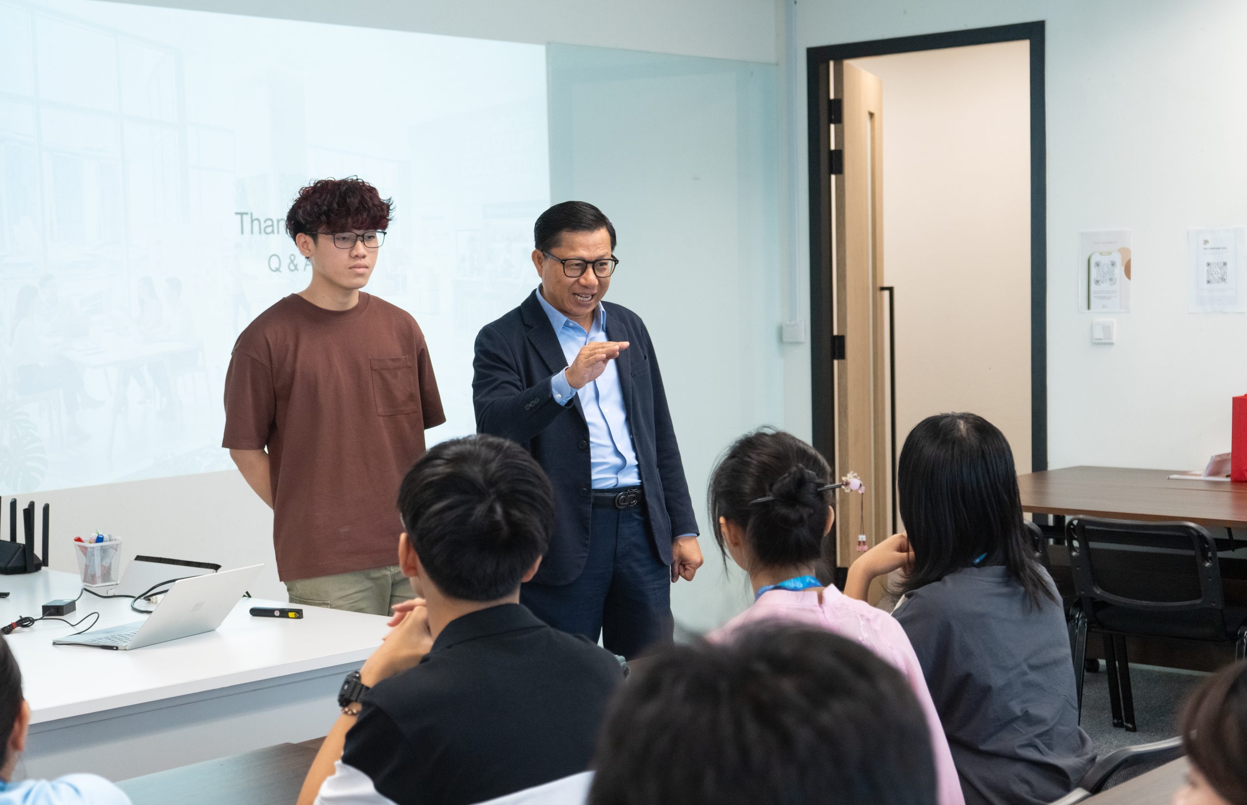 Mr Kevin Dinh Hoang Ha answering questions about studying at Hanbridge Institute and student life in Singapore.