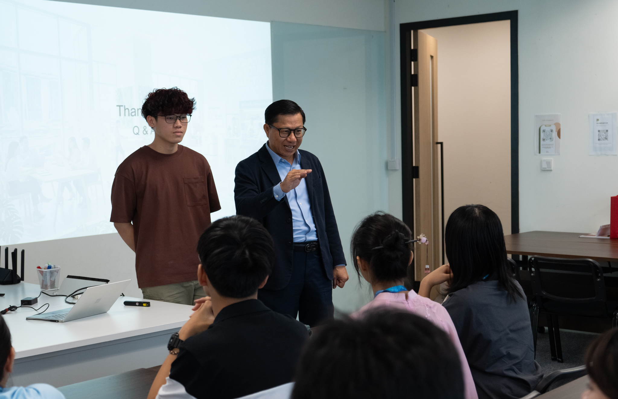 Mr Kevin Dinh Hoang Ha answering questions about studying at Hanbridge Institute and student life in Singapore.