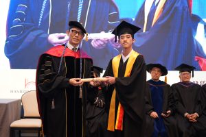 Dr Alan Go presenting Higher Diploma and Foundation Certificate awards at Hanbridge Institute Graduation 2026