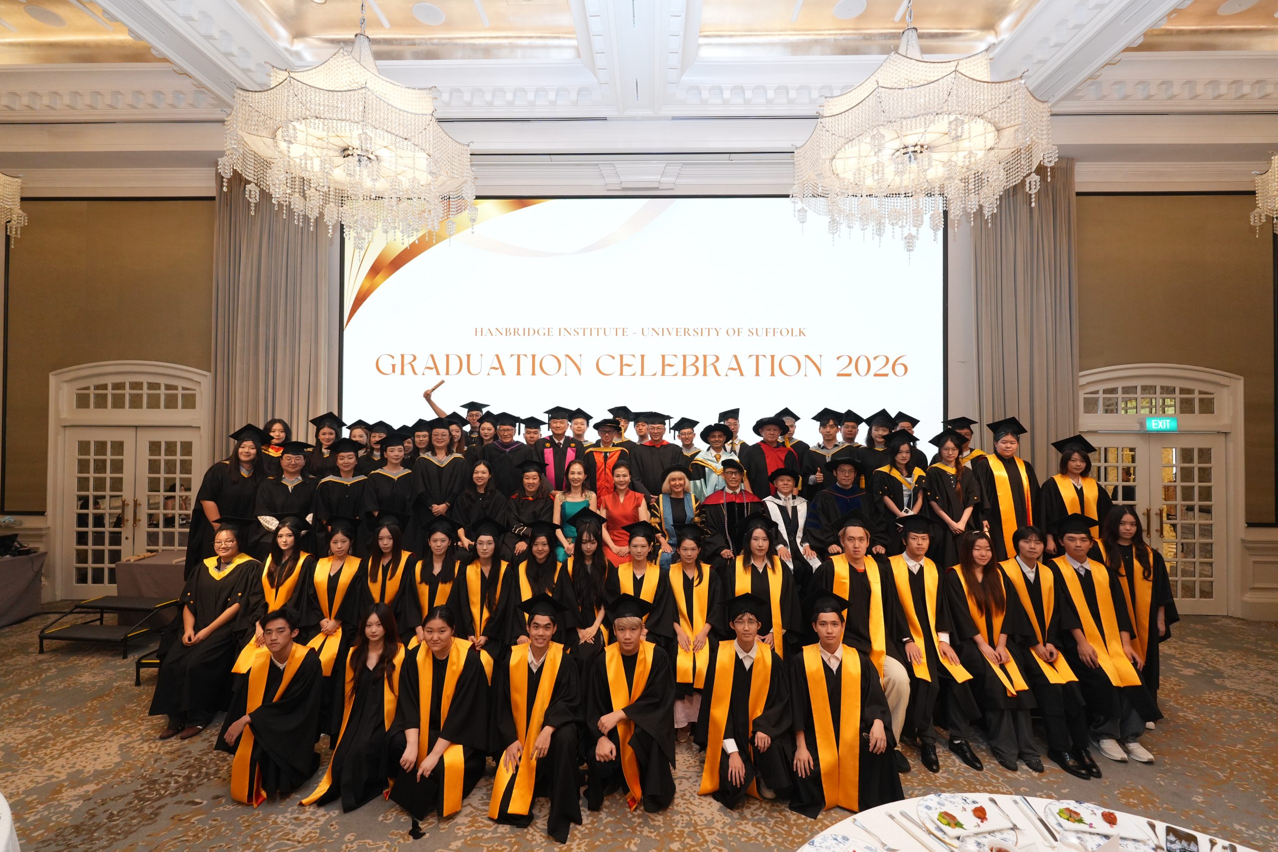 Hanbridge Institute Class of 2026 graduates celebrating their academic achievements at Raffles Hotel Singapore