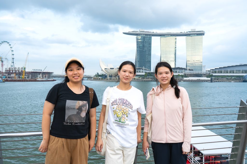 International students from diverse cultural backgrounds studying together in Singapore