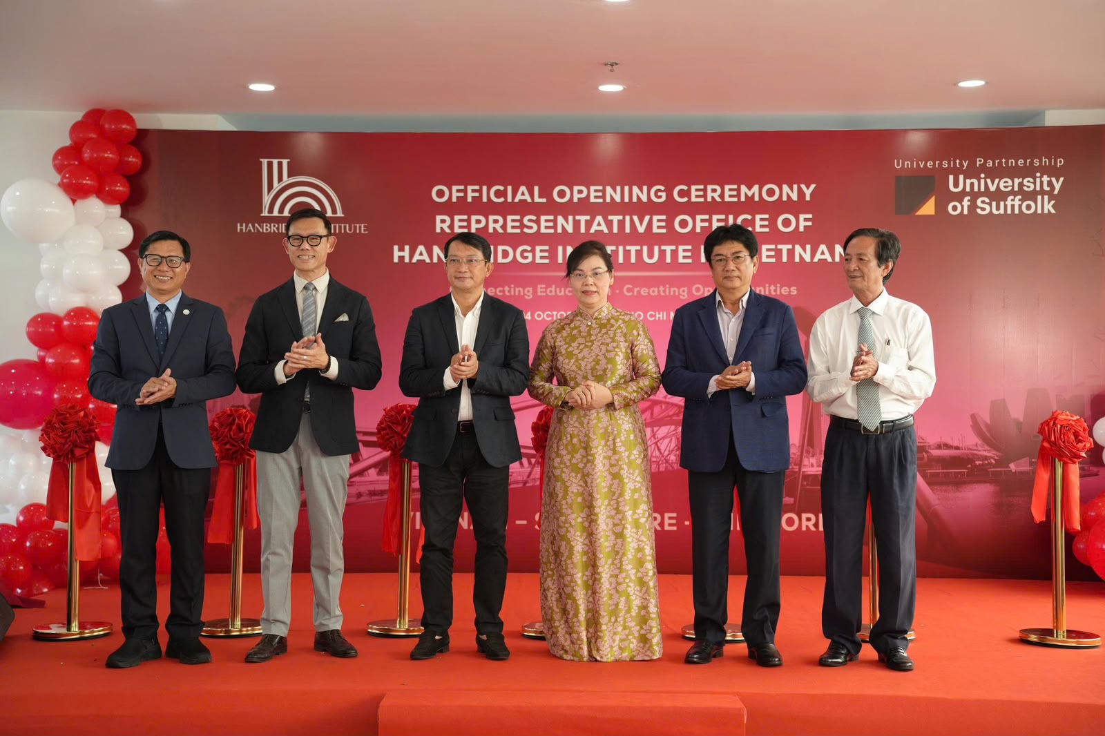 Dr Alan Go and Mr Kevin Dinh with distinguished representatives at the ribbon-cutting ceremony for Hanbridge Institute’s Vietnam office