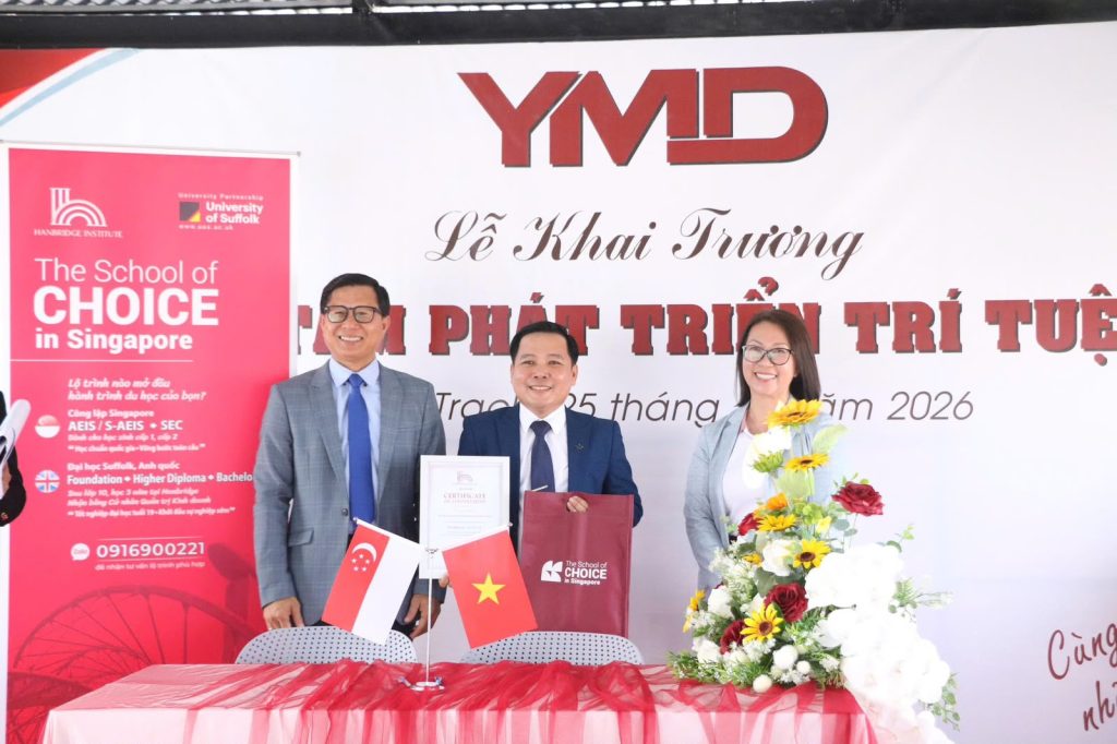 Dr Kevin Dinh and his wife with Master Nguyễn Quang Tánh, Director of Youth Mind Development Centre (YMD), in Vietnam.